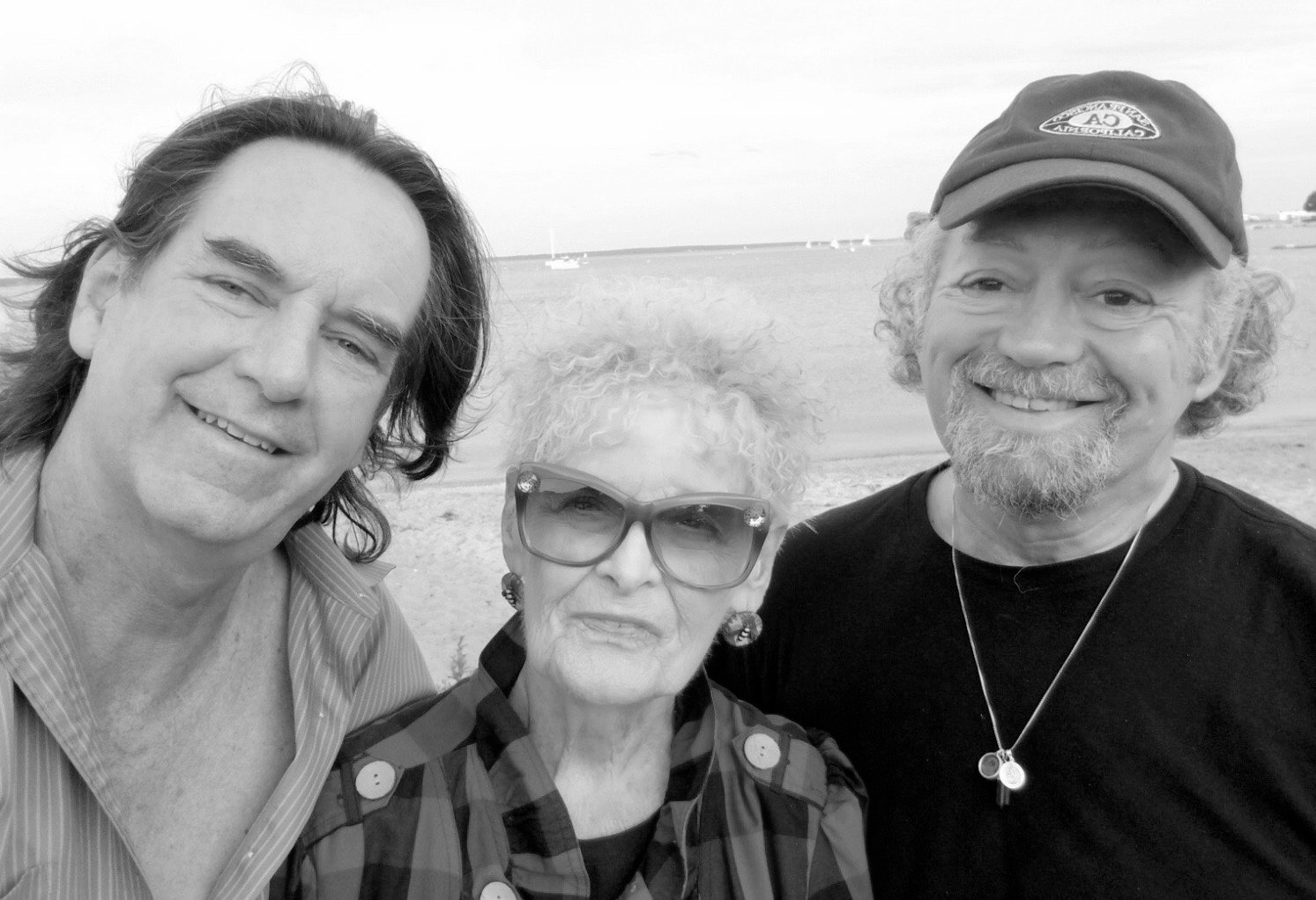 PLAYING A CENTER ROLE: Gloria Walker is pictured with Brian Belovich, at right, and his husband Jim Russellas pictured in Wickford when Brian and Jim visited last summer.